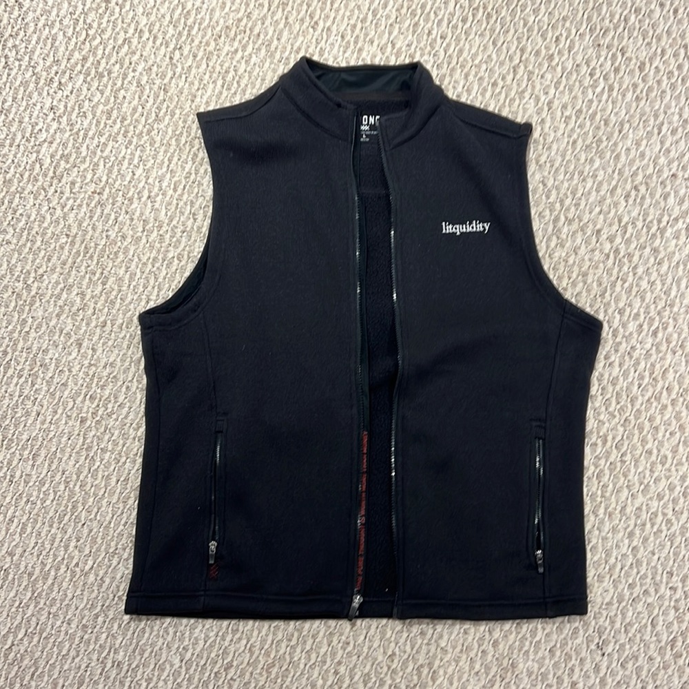 Rhone Vest with logo from “Litquidity”